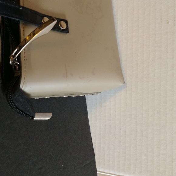 Beijo a pearlized gold color with black straps and trim. - Picture 4 of 14